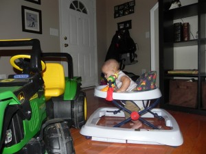 Our lil' guy checks out the BIG tractor